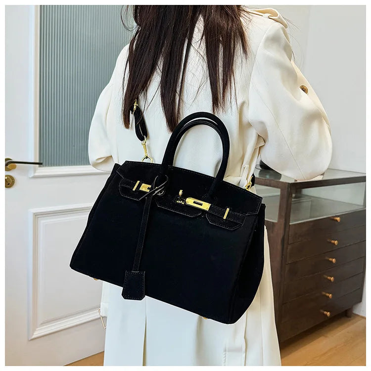 Alejandra - Bandolera de ante con herrajes dorados Aviero Madrid