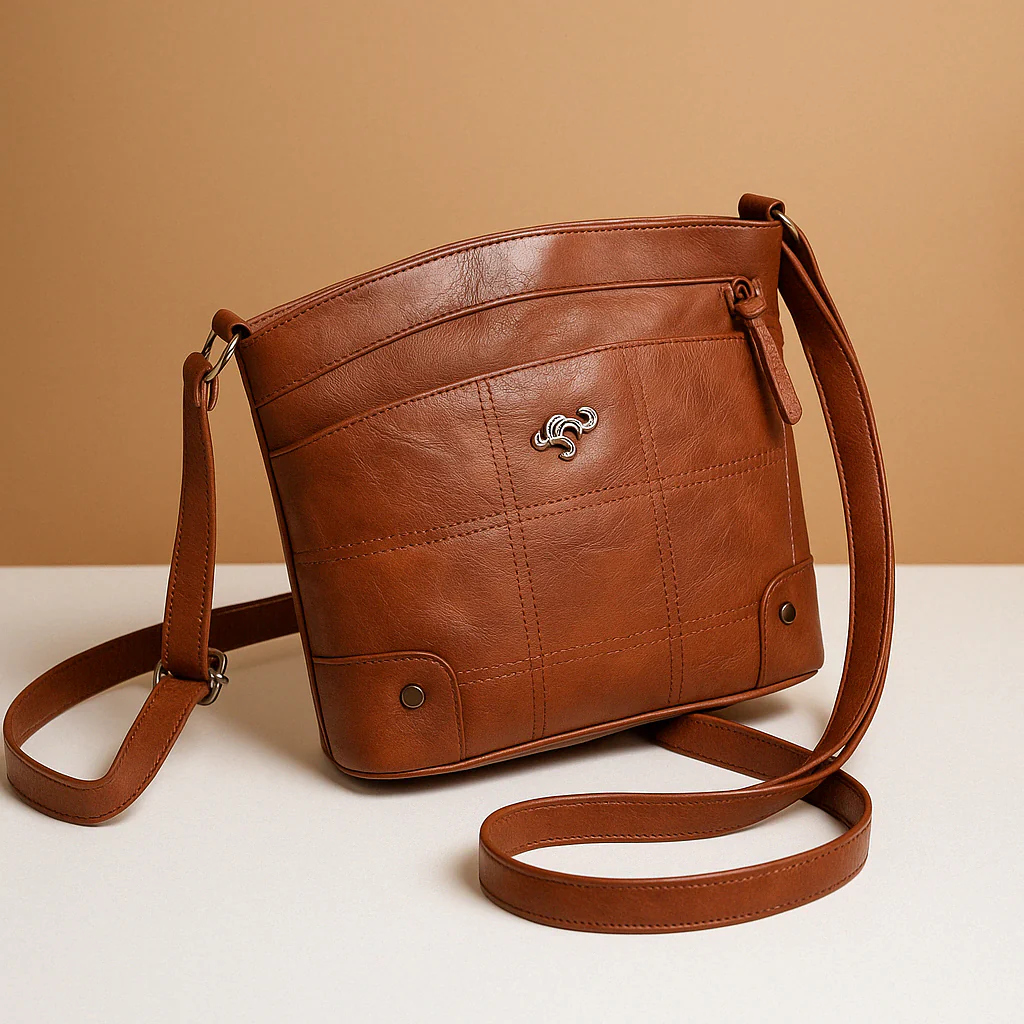 Compacte schoudertas met effen kleur en elegante afwerking voor dames | Isabelle Stilovero