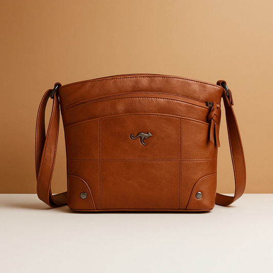 Compacte schoudertas met effen kleur en elegante afwerking voor dames | Isabelle Stilovero